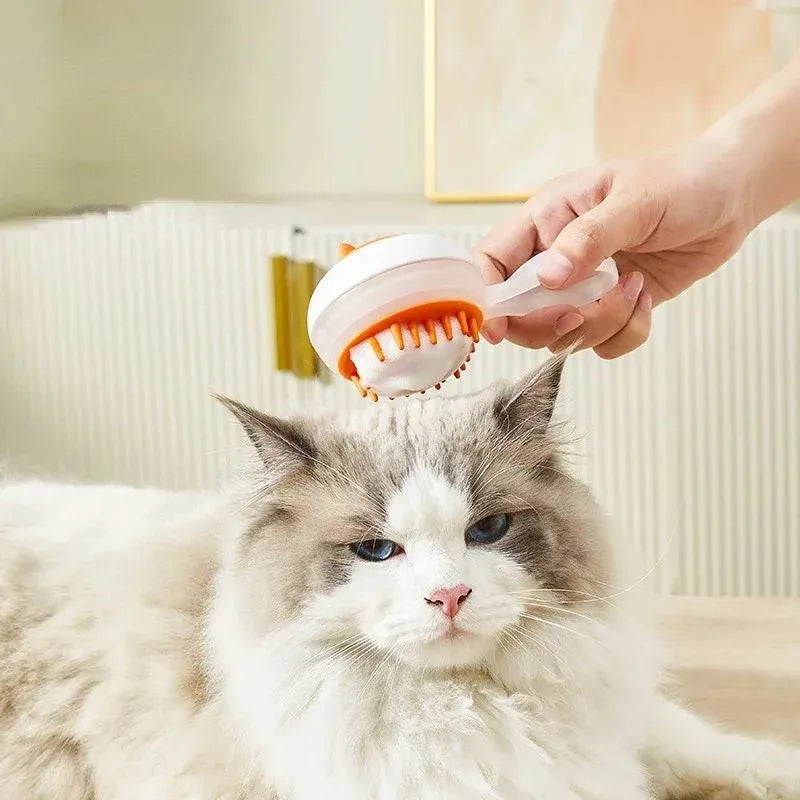 Blue automatic pet bath brush with soft gel head and hair removal comb on a white background.