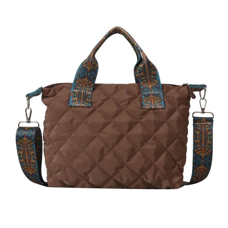A soft oxford cloth shoulder messenger bag in a horizontal square shape with a single strap.