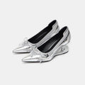 Women's black pointed toe Mary Jane shoes with a unique floating shaped heel