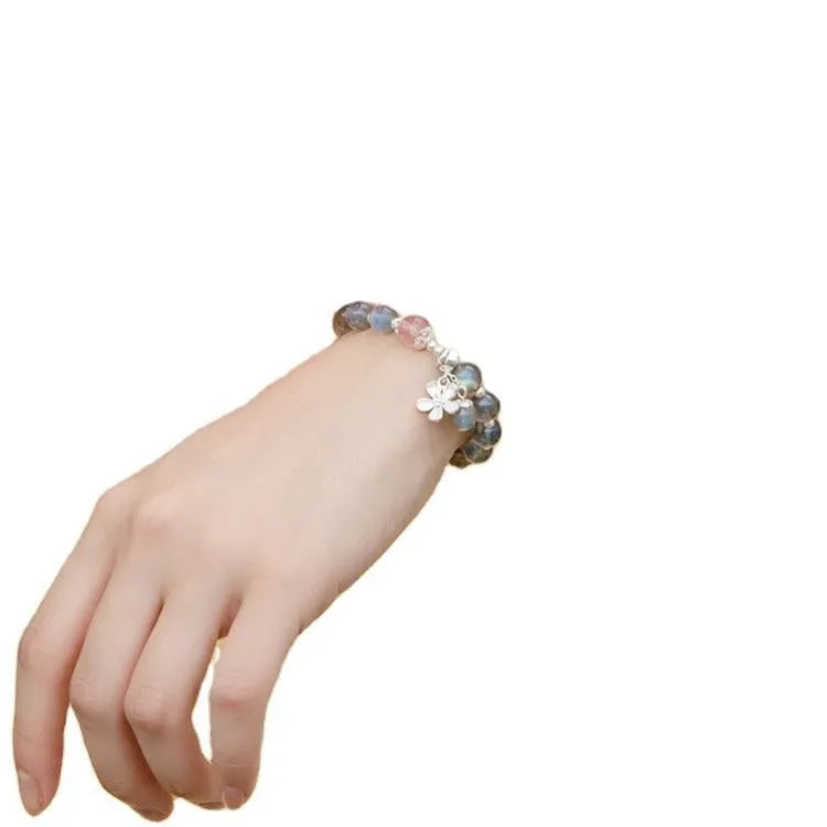 Women's 7.5mm crystal bracelet with zodiac charms and 925 silver clasp in moonlight lime or strawberry pink