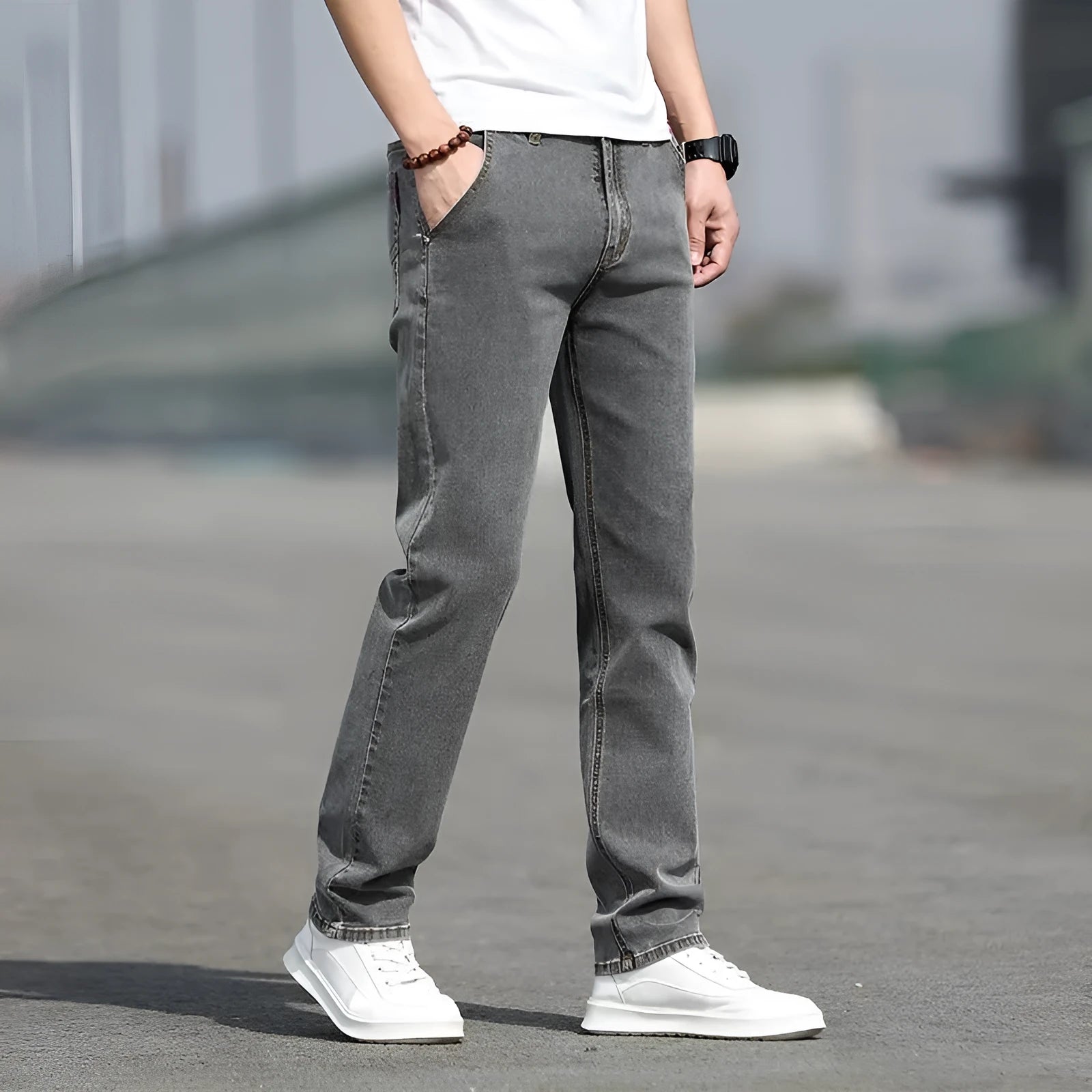 Men's straight leg jeans in smoky gray with low waist and zipper fly closure