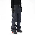 A pair of dark blue loose straight-leg men's jeans on a plain background.