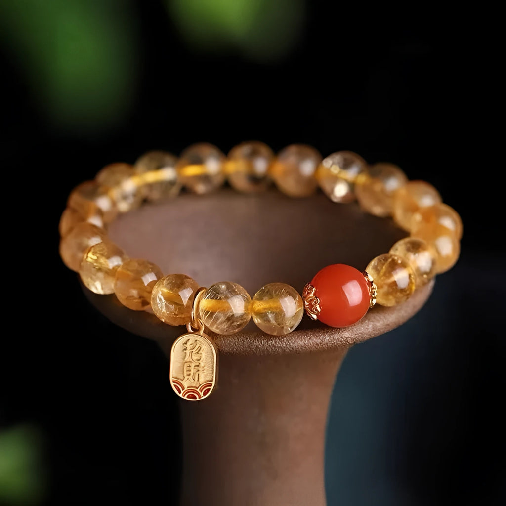 Polished red agate bead bracelet on gold-plated chain, showing bead size options of 6mm, 8mm and 10mm.