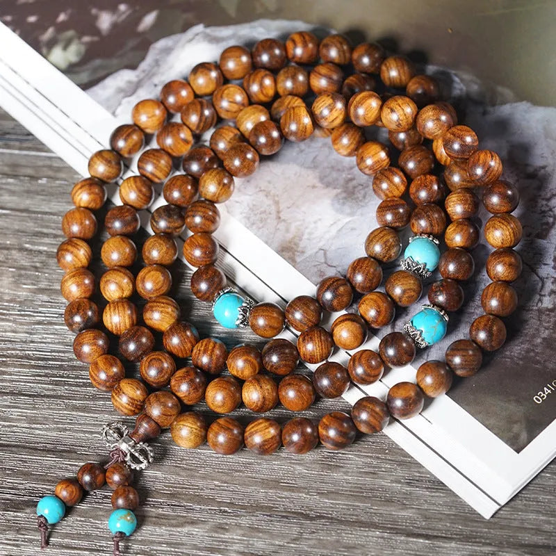 Handmade geometric stone bead bracelet with 108 polished beads in natural colour