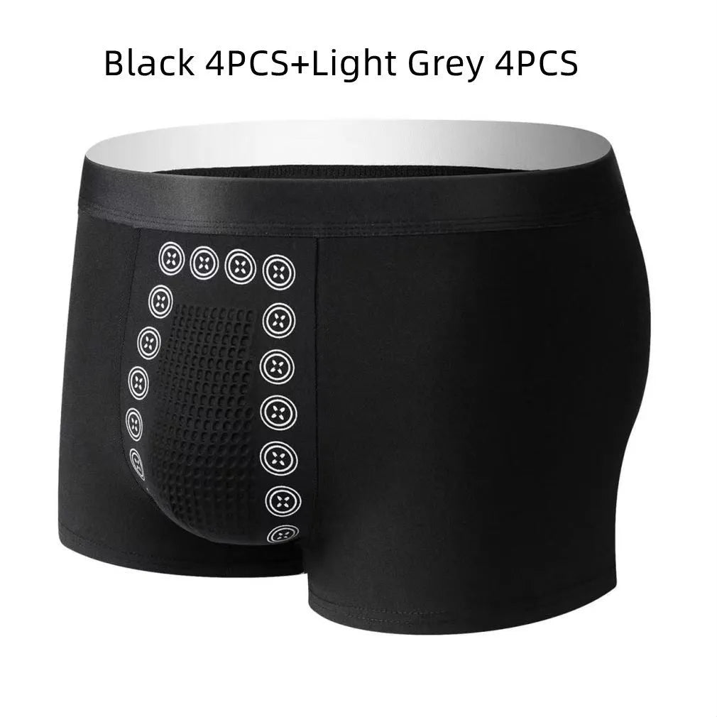 Men's massage particle underwear in solid colours with mid waist design and breathable milk silk fabric
