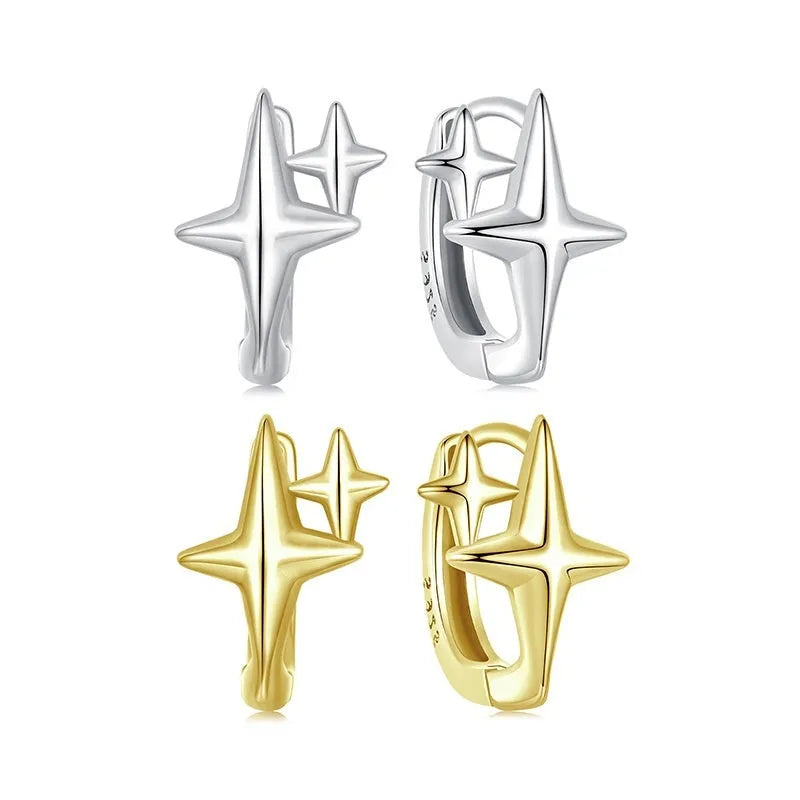 Minimalist star design sterling silver ear clips with oxidation finish and clip-on back.