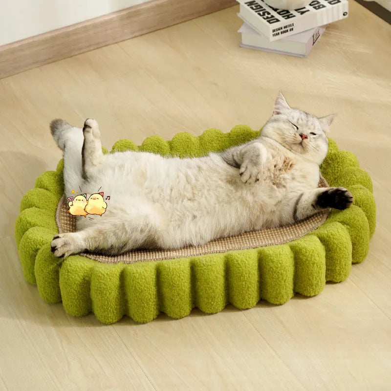 Green oval cat scratch pad bowl with sisal scratching surface measuring 65cm by 42cm