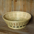 Handmade bamboo storage basket showing woven construction with three size options for household organisation