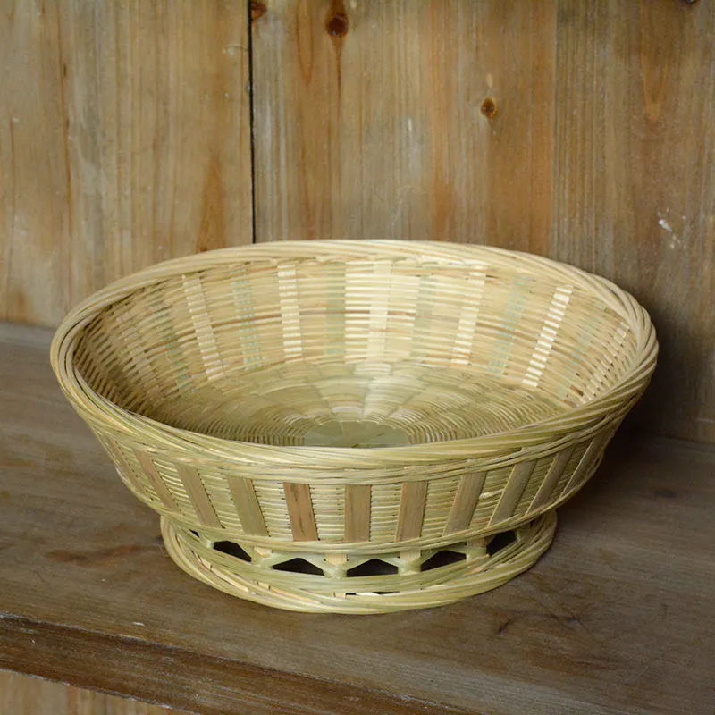 Handmade bamboo storage basket showing woven construction with three size options for household organisation