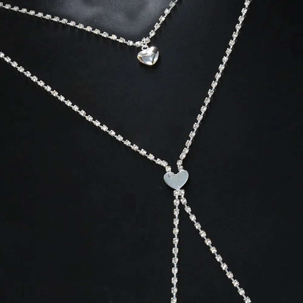 Women's heart-shaped rhinestone body chain jewellery in gold and silver electroplated finishes