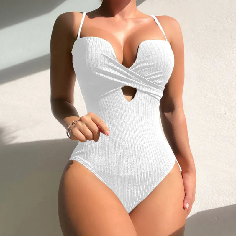 One-piece solid-colour swimsuit for adult women in rose red, white, or burgundy with polyester fibre construction