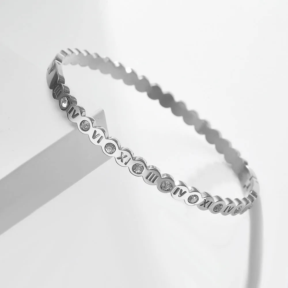 Korean style titanium steel bracelet with electroplated finish and numeric details in gold, rose gold, or steel colour