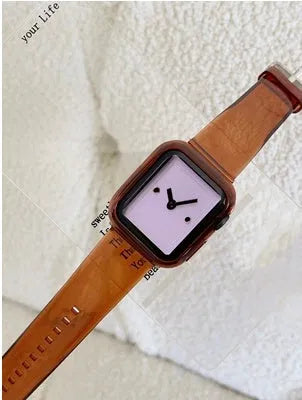 Brown transparent Apple Watch compatible replacement strap showing multiple colour options