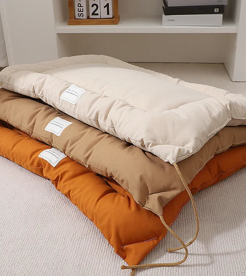 Tied cage cushion for dogs and cats in beige, coffee, or orange colours with four size options