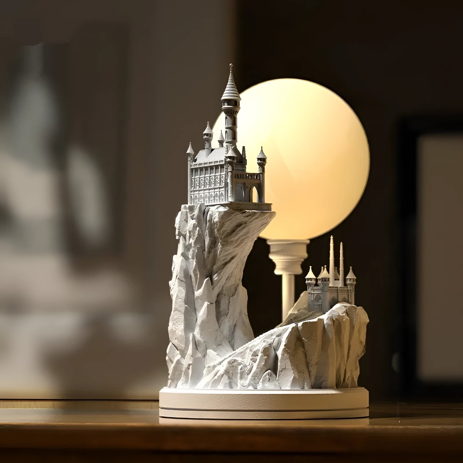 White composite gypsum table lamp with a plug-in cord and wire switch, shown on a bedside table.