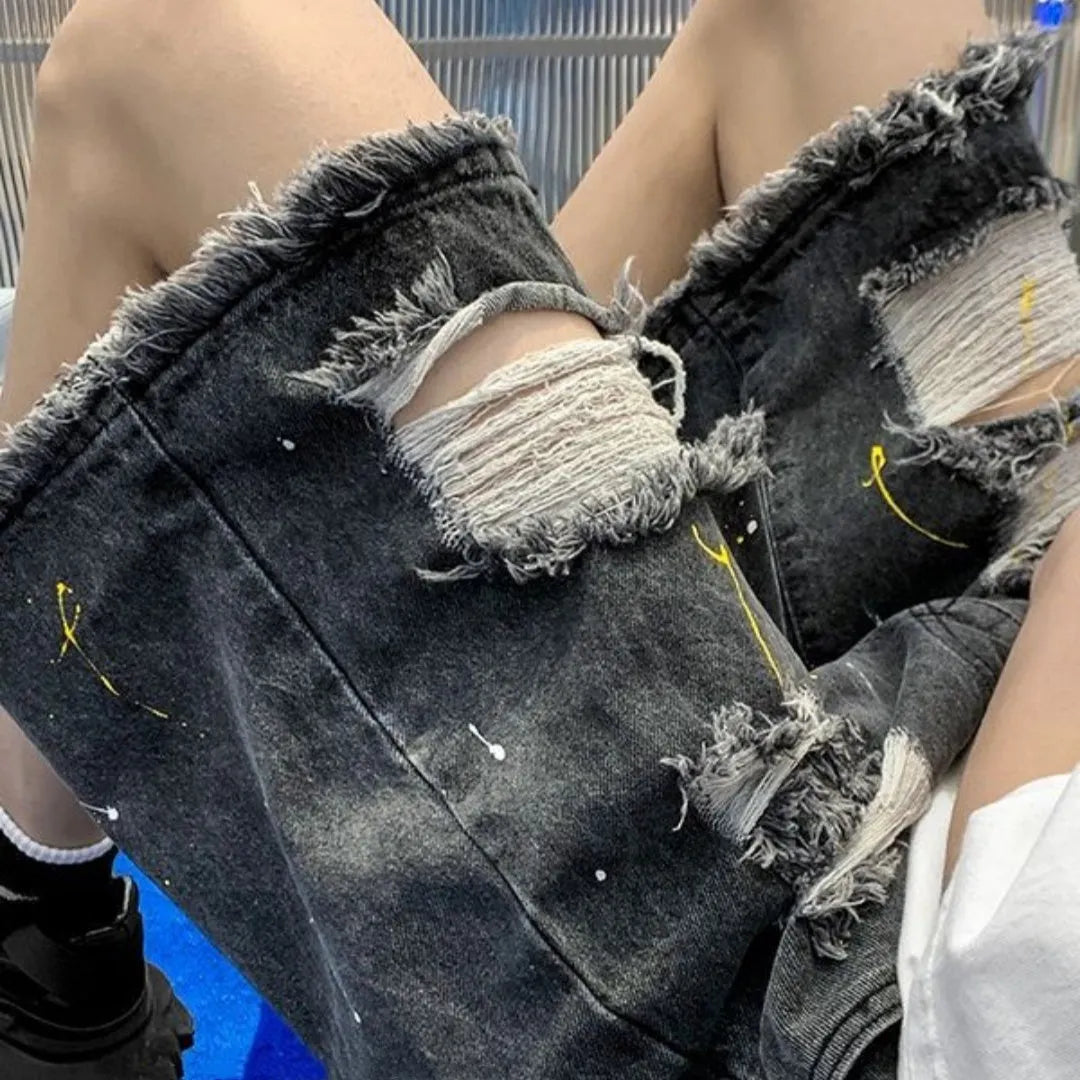 Men's loose fit water washed hole denim shorts in black and light blue colours, fifth pants length cut
