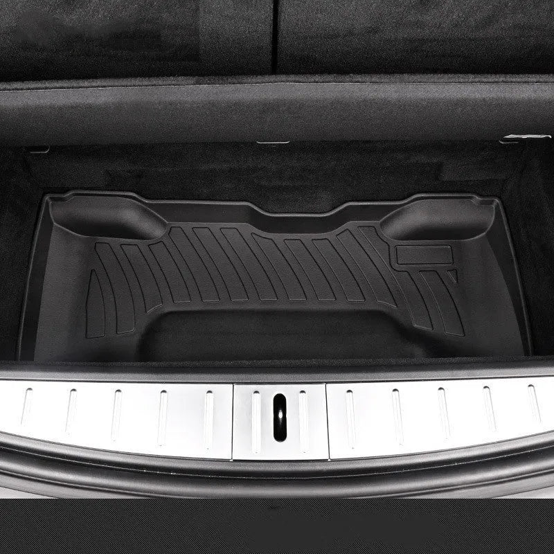 Rubber floor mats for Tesla cars with TPE footrest, custom-fit to Model 3, Y, S, X interiors, showing non-slip backing and textured surface