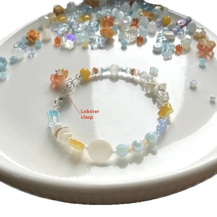 Water-soaked Bracelet Orange Sea Summer Dopamine Seaside showing diamond shapes and round elements on alloy band