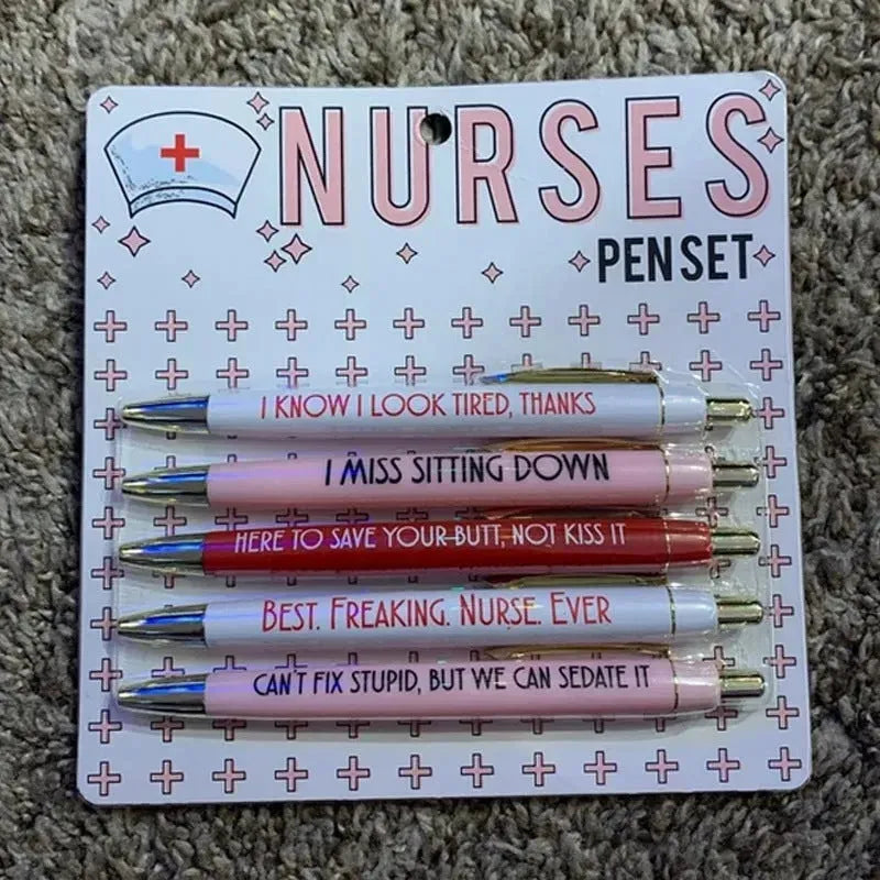 Five nurse theme ballpoint pens with humorous decoration arranged together