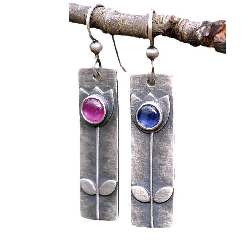Antique finish geometric earrings with 8mm oval red sapphire centre stone on sterling silver