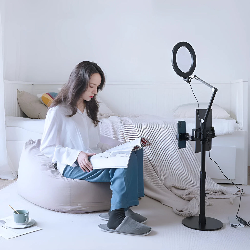 Black floor-standing mobile phone tablet holder with vertical folding rotation and fill light