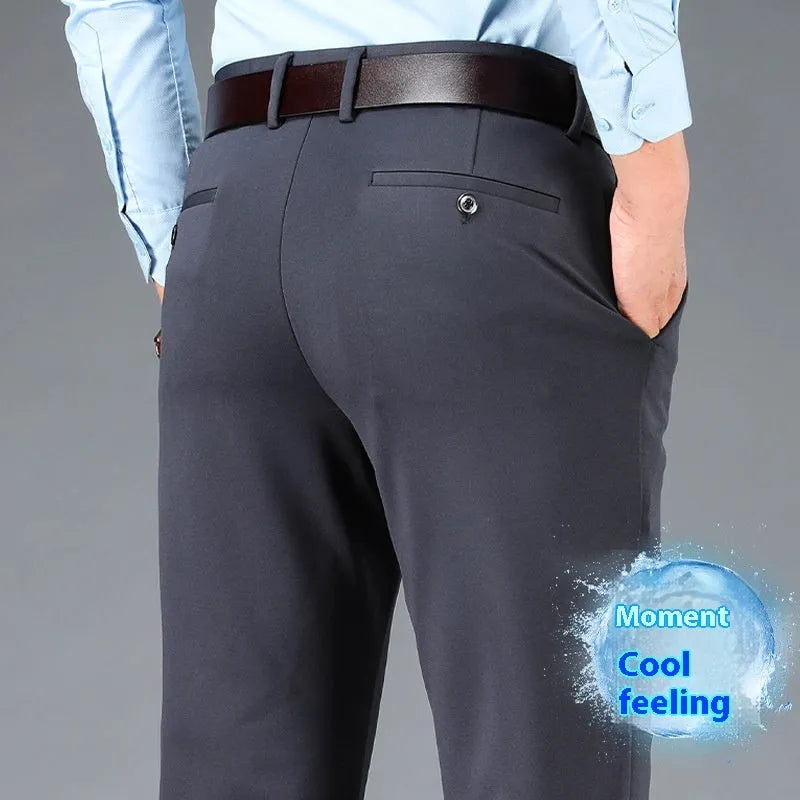 Men's straight-leg suit pants in dark blue with an elastic waistband, shown in a plus-size fit.