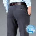 Men's straight-leg suit pants in dark blue with an elastic waistband, shown in a plus-size fit.