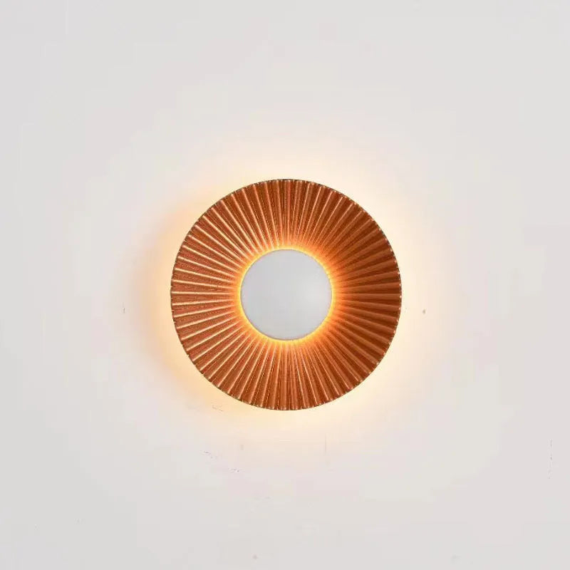 Round wall lamp with aluminium shade and LED light source for bedroom lighting