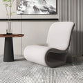 Grey single sofa chair with metal frame and soft flannelette upholstery on a wooden floor.