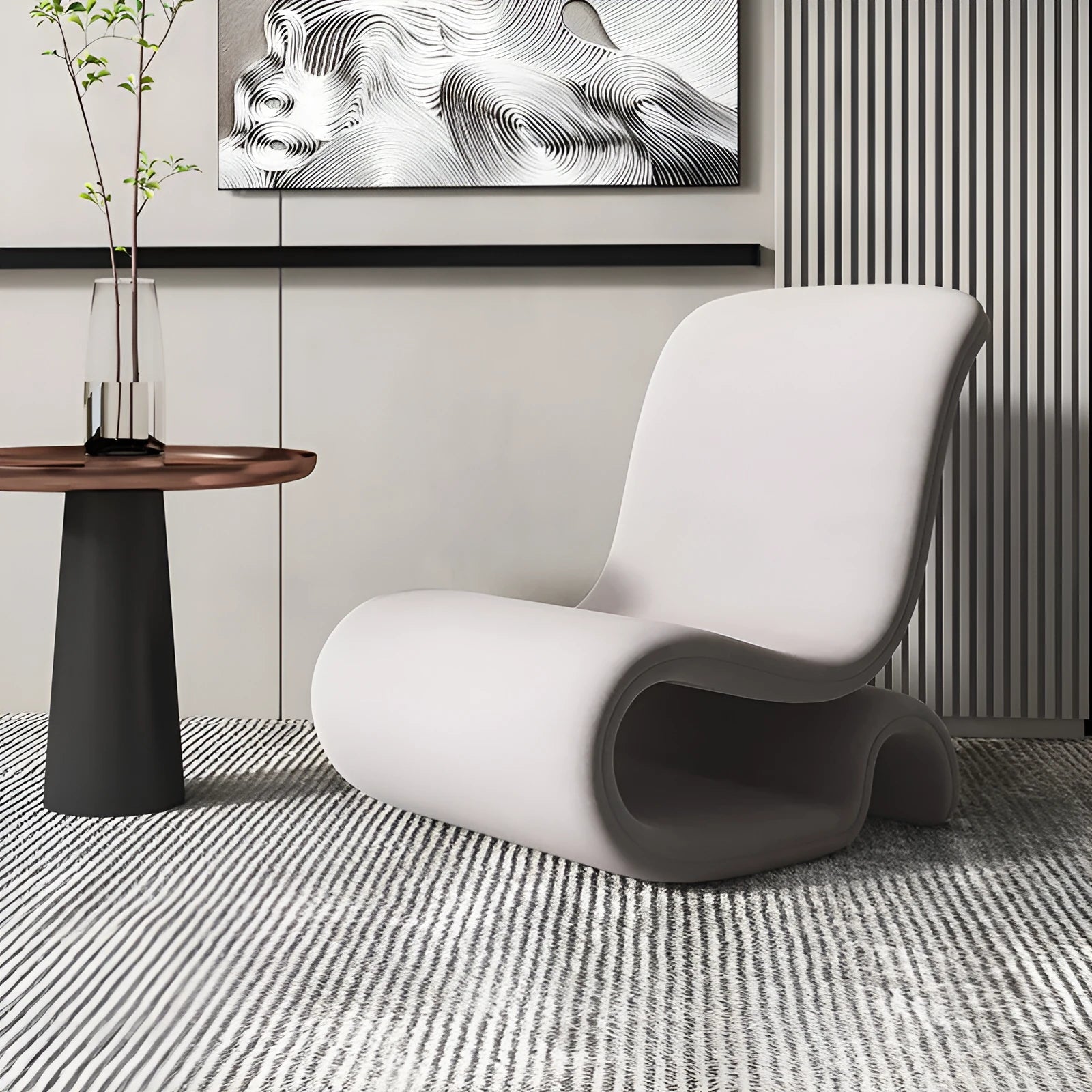 Grey single sofa chair with metal frame and soft flannelette upholstery on a wooden floor.