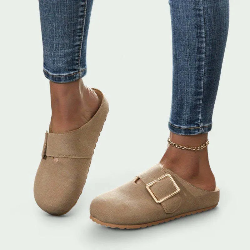 Women's low-top canvas slippers in apricot colour with closed toe and cushioned sole.