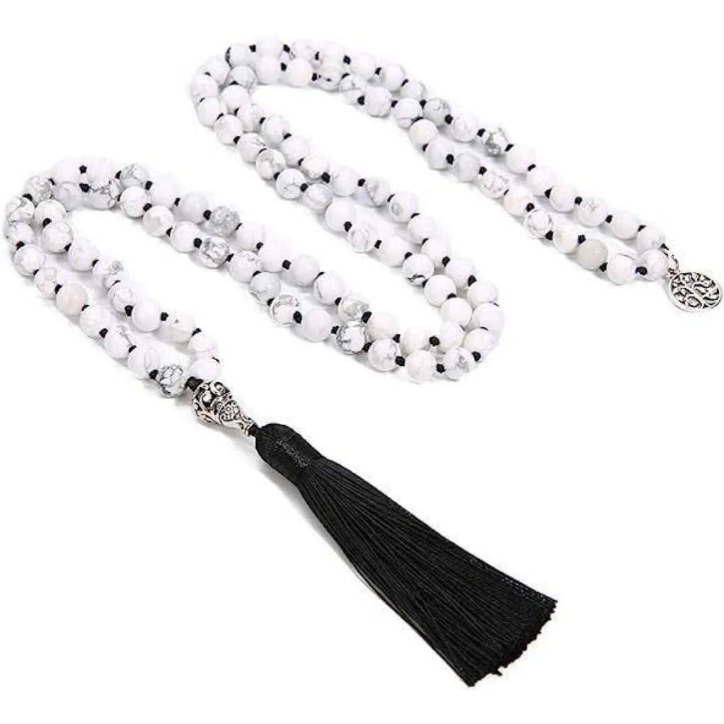 Handmade knotted beaded necklace with 108 stone pendants showing colour variations