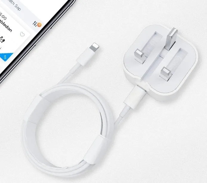 White British 20W PD fast charger with UK plug and Type-C cable on a table