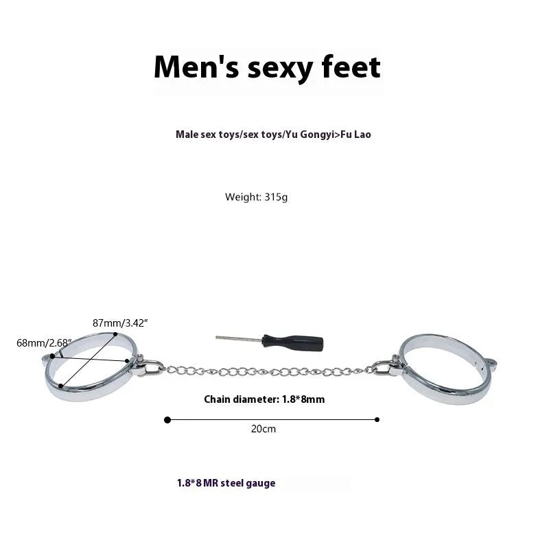 Silver zinc alloy handcuffs and footcuffs set with stainless steel chain linking on black background