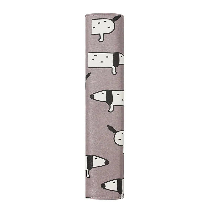 PU leather car seat belt shoulder pad with Dachshund cartoon design, 14cm by 22cm.