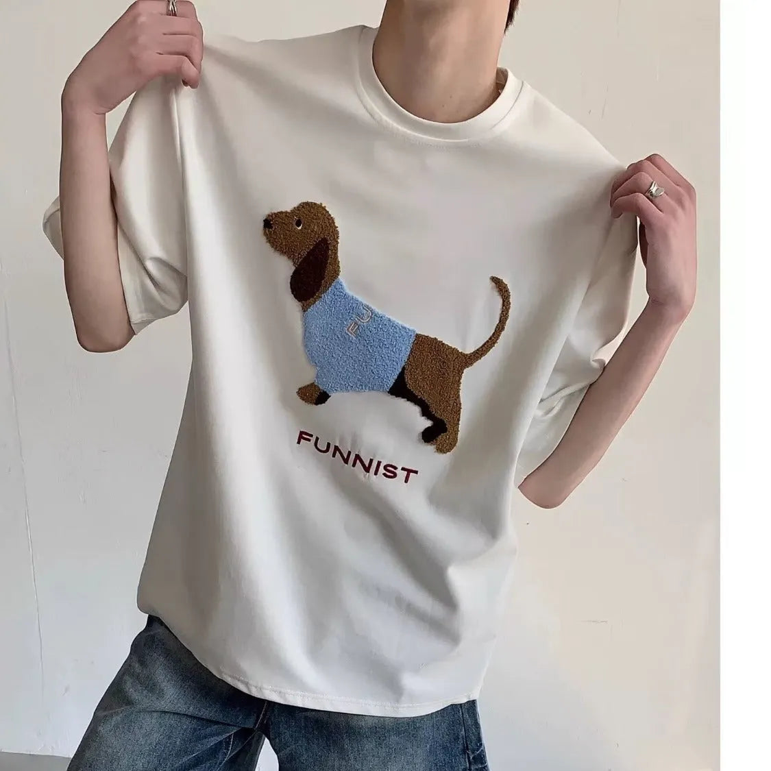 Sausage dog towel embroidery on a grey round neck short sleeve cotton T-shirt