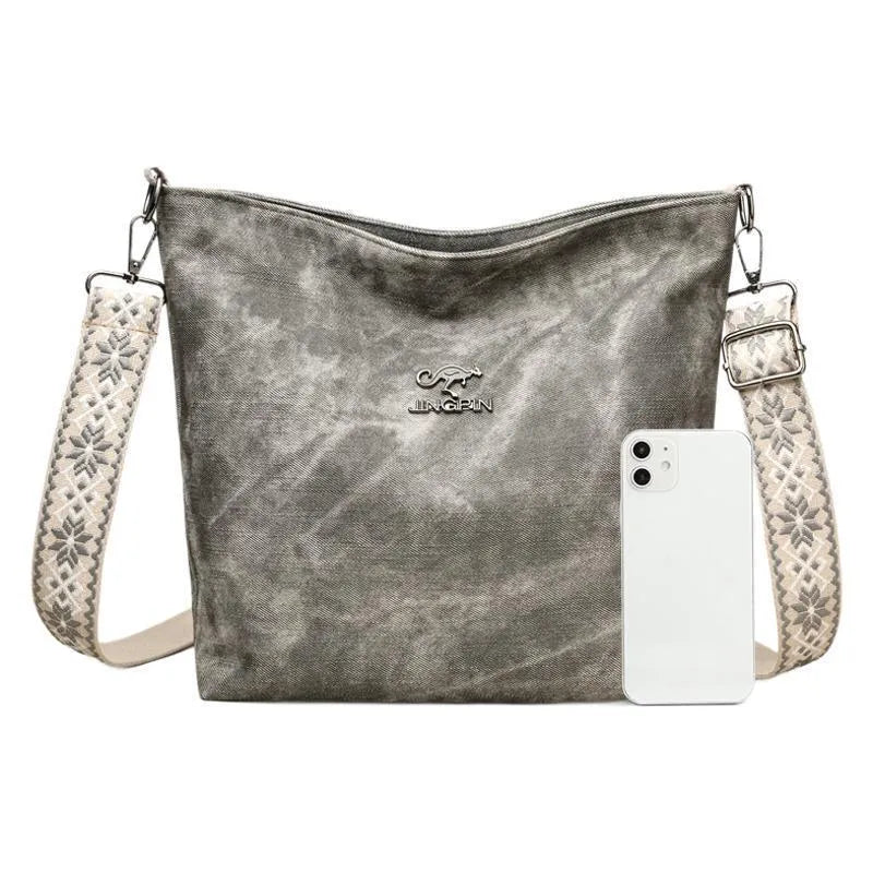 Soft PU large capacity crossbody bag in pink, grey, or yellow with an adjustable shoulder strap.