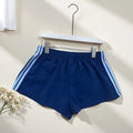 Navy blue men's high-waist nylon sports shorts on a white background