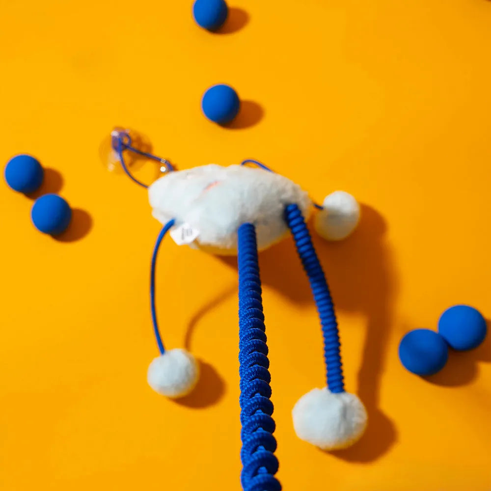 Blue telescopic cat toy with plush ring and bell measuring 30 by 30 centimetres