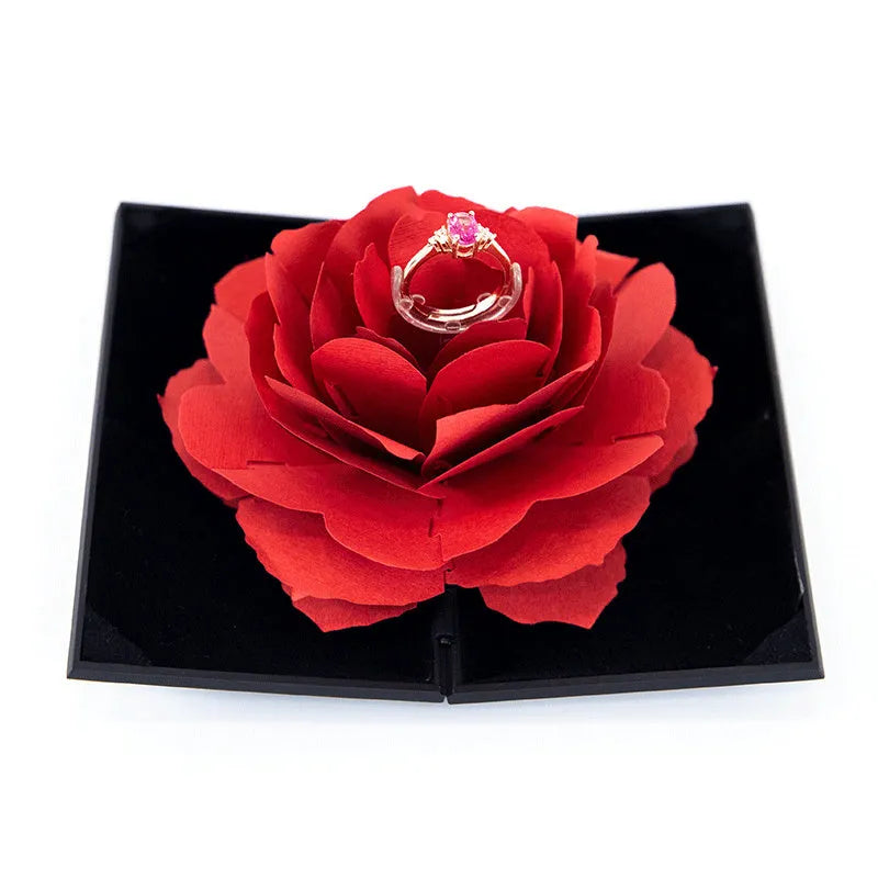 Rotating heart-shaped ring box with 3D rose decoration in red colour