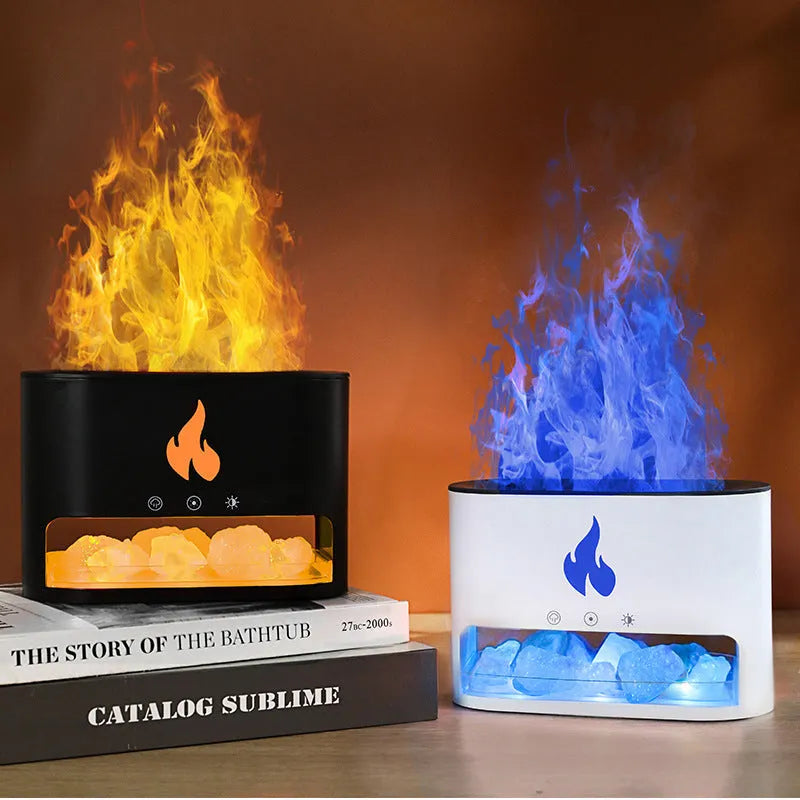 Square white flame effect humidifier and aromatherapy diffuser with coloured 3D light on a desk.