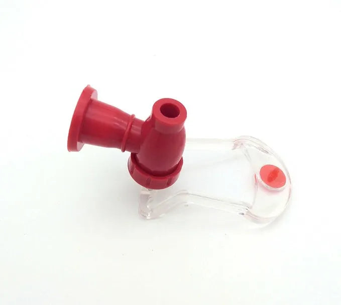 Red Magic Tap soda dispenser attached to 2-litre bottle for home drink serving