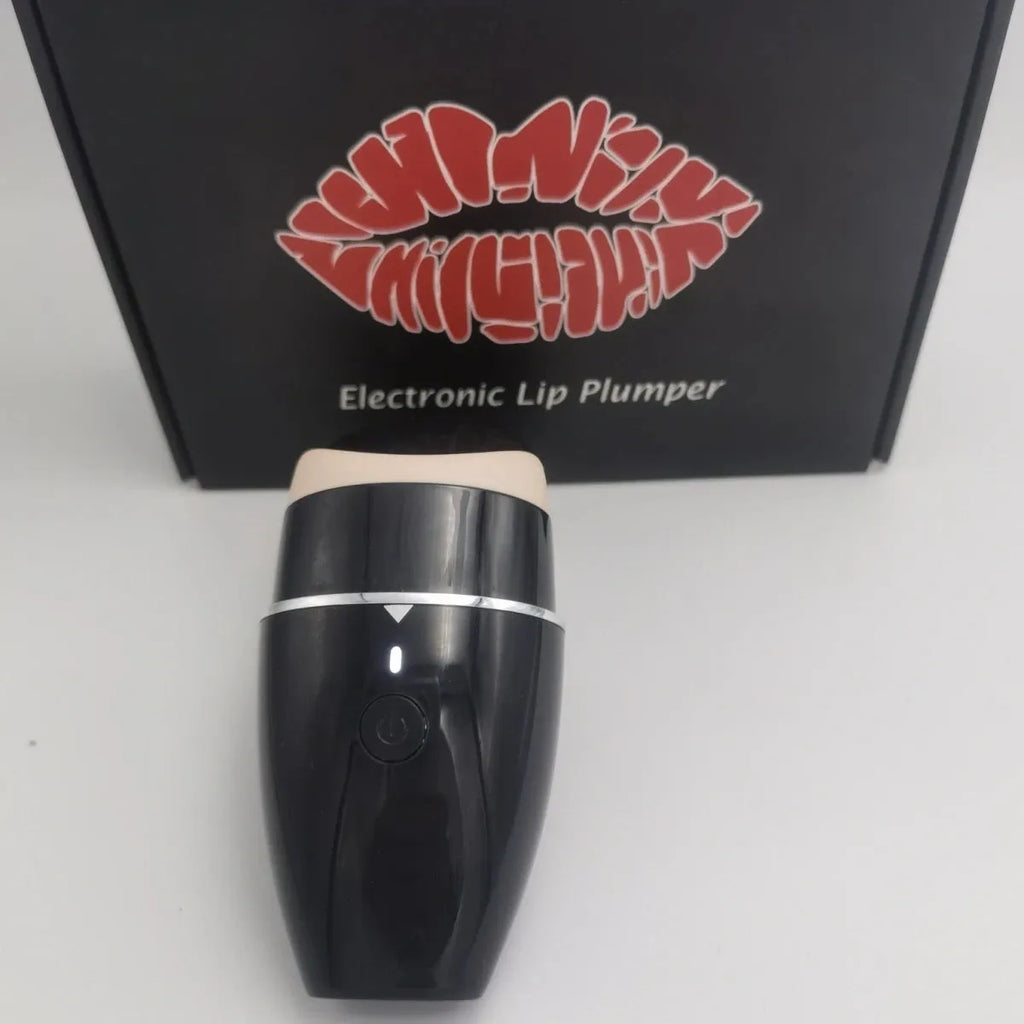 Black electric lip plumper with silicone nozzle and USB cable