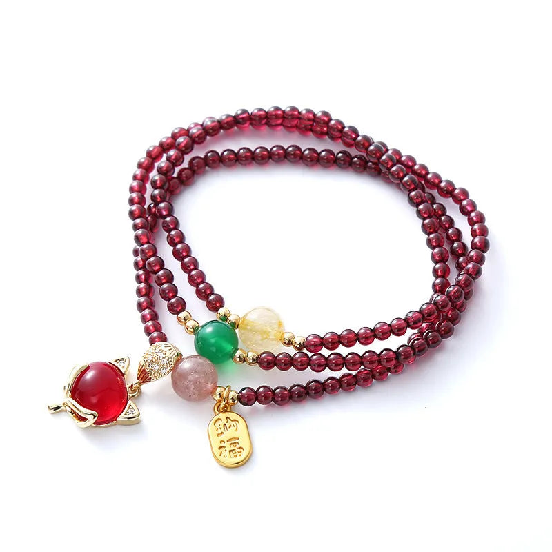 Purplish red garnet fox charm adjustable bracelet for women on rope cord