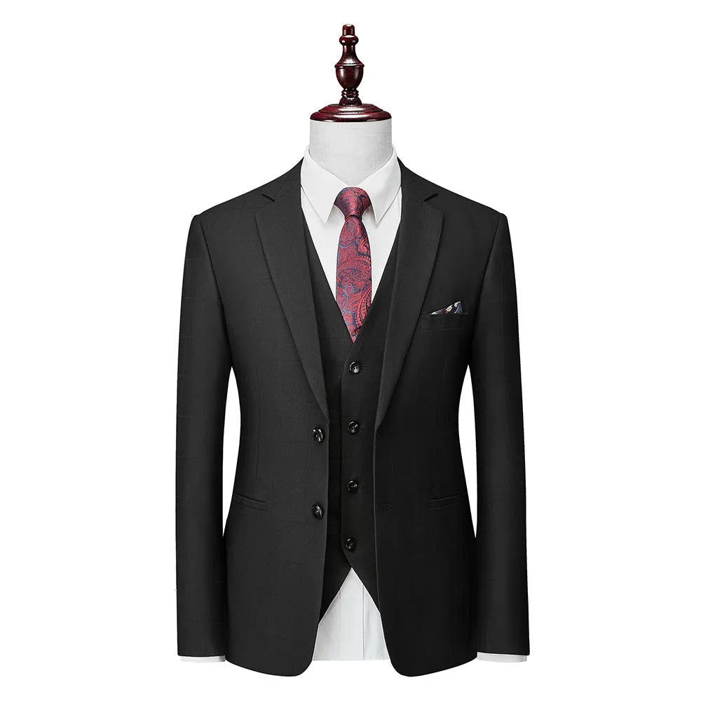 Men's navy blue three-piece slim fit suit with jacket, vest, and trousers on hanger