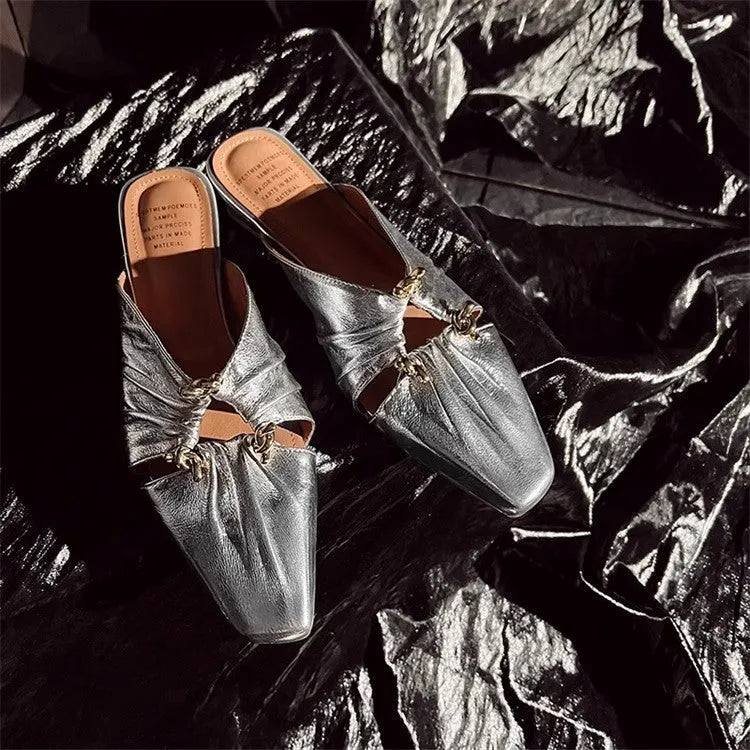 Women's genuine leather half-toe cap slippers in silver with a square toe and low TPR sole.