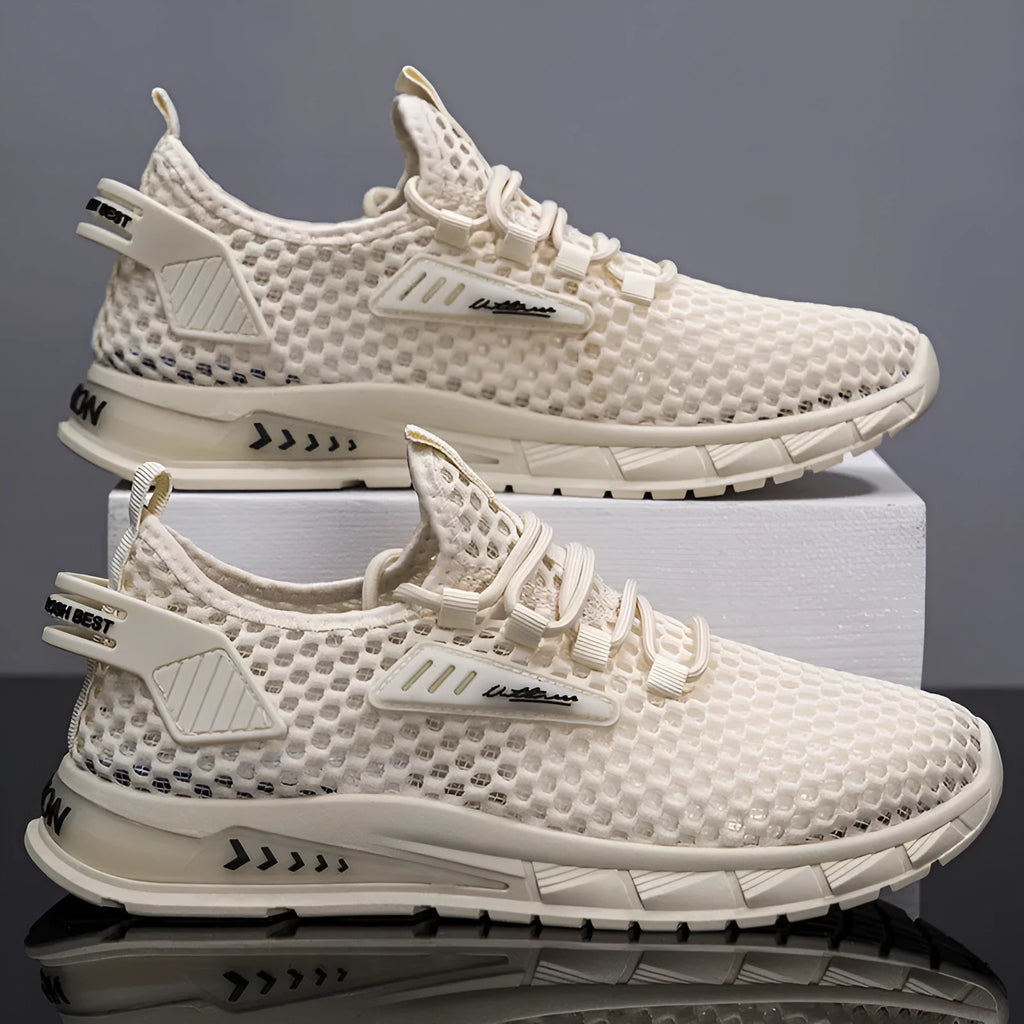 Men's beige mesh sneaker with synthetic leather upper and lace-up closure on a flat EVA sole.