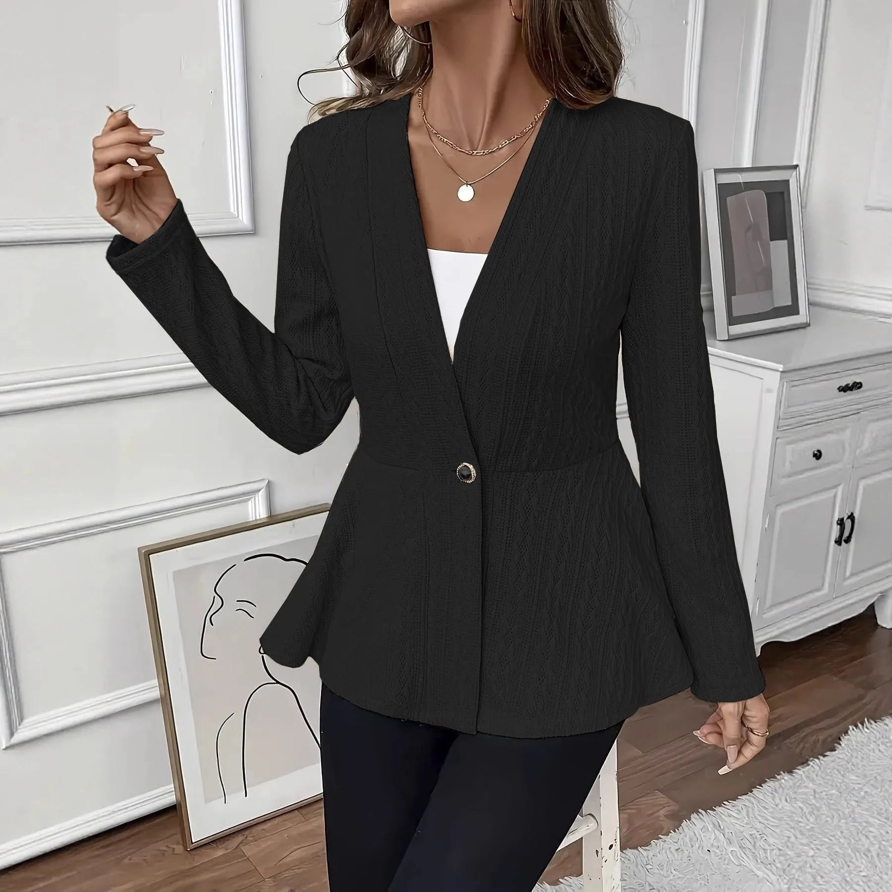 Women's apricot coloured Jacquard patterned knitted cardigan with single button front closure