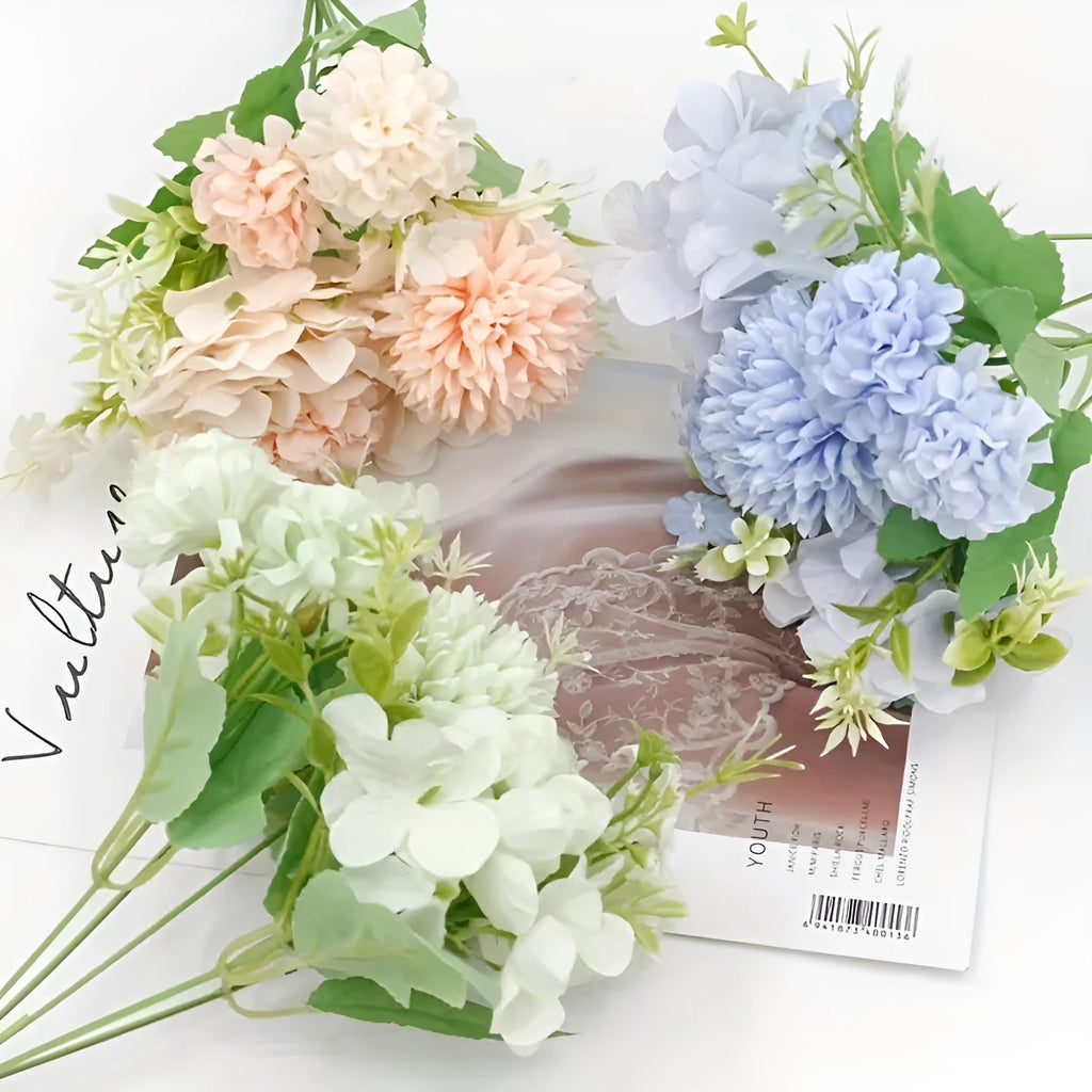 Artificial hydrangea flower with raw silk bloom on a plastic stem in blue.
