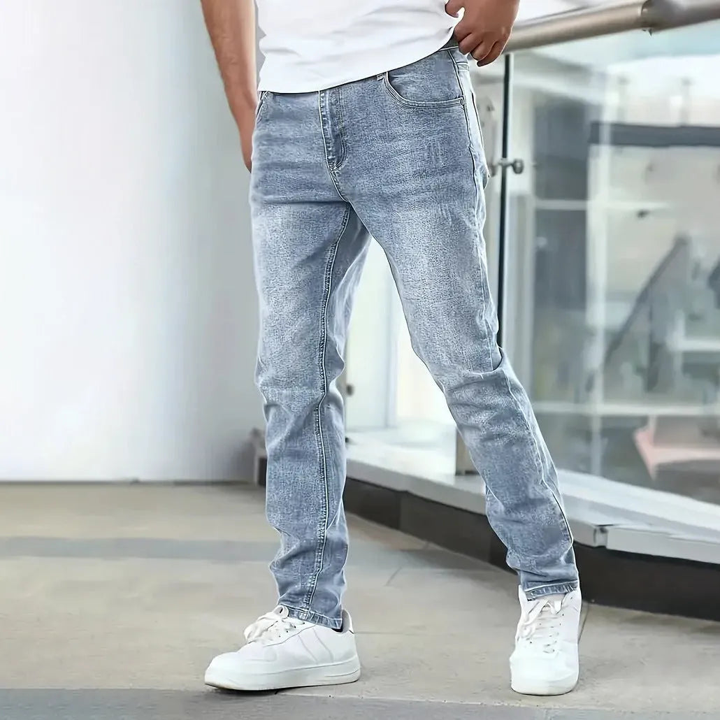 Men's slim straight stretch jeans in black cotton fabric with mid-waist and zipper fly
